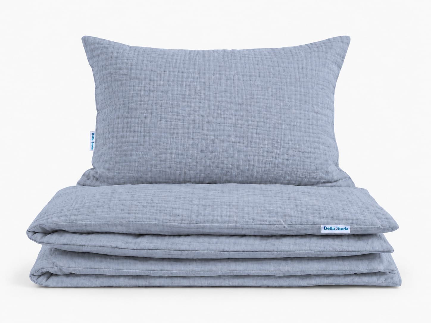 Pościel 160x200 muślinowa jeans niebieska Musinella w pudełku - komplet niebieskiej pościeli na jasnym tle
